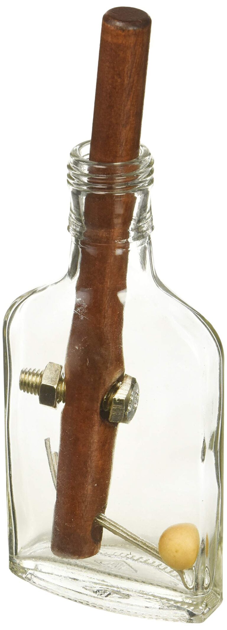 Wooden dowel in a glass bottle with bolts and a small wooden ball
