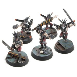 Five miniature figures of a sci-fi warrior squad, armed and ready